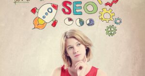 Woman working on SEO on a laptop